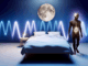 alt_text: A serene bedroom scene with a relaxed person, gentle wave patterns, and soothing moonlight.